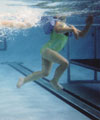 go swimming at an indoor pool